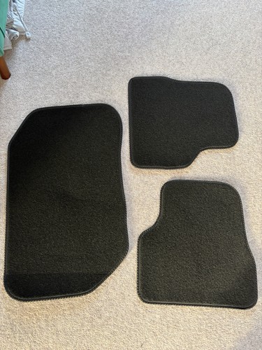 Three brand new car mats - brand,